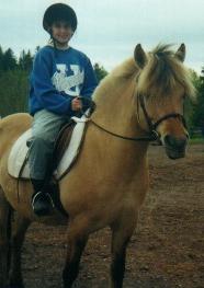 Me getting riding lessons on a horse named Maryke (Pronounced mar-eye-kah)